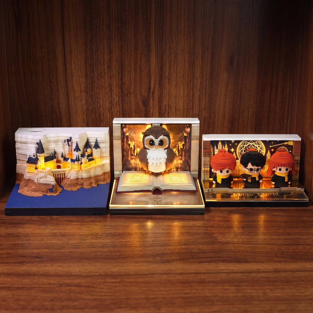 Hogwarts Castle, Hedwig and Golden Trio 3D calendars side by side
